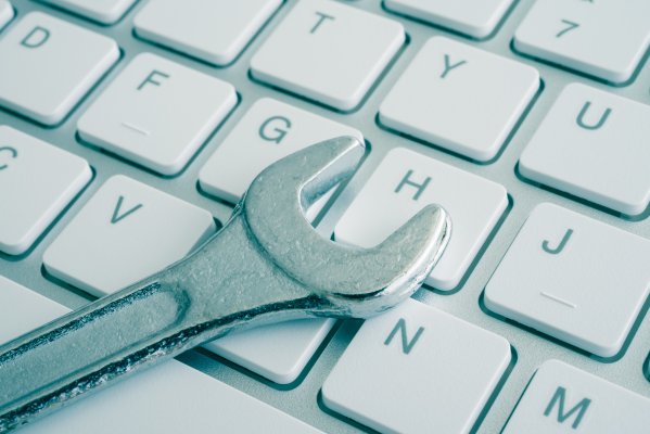 system optimizer software white computer keyboard with wrench on top